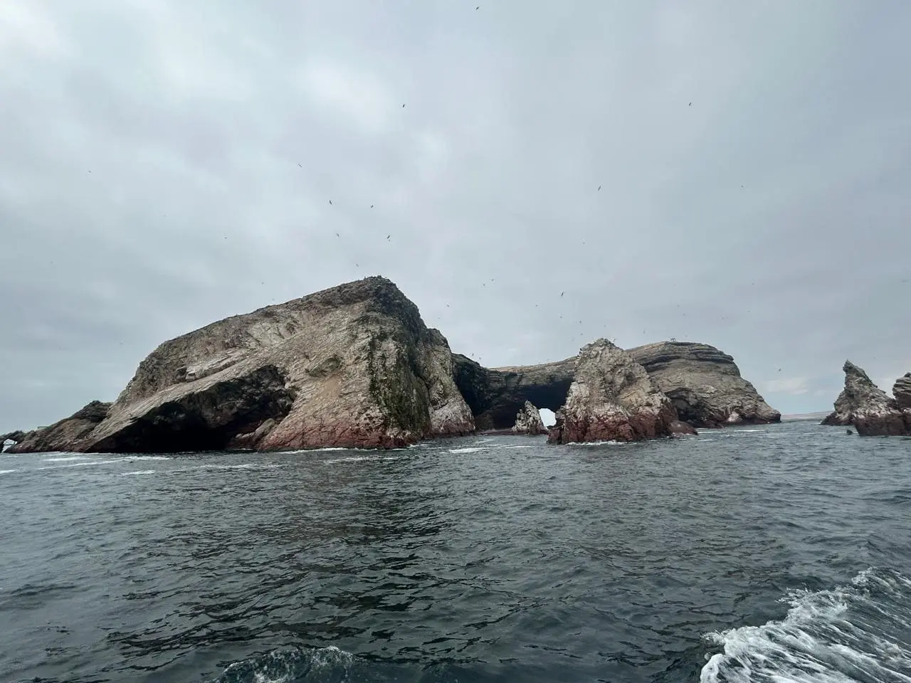 Natural rock arch at Ballestas Islands near Paracas Peru