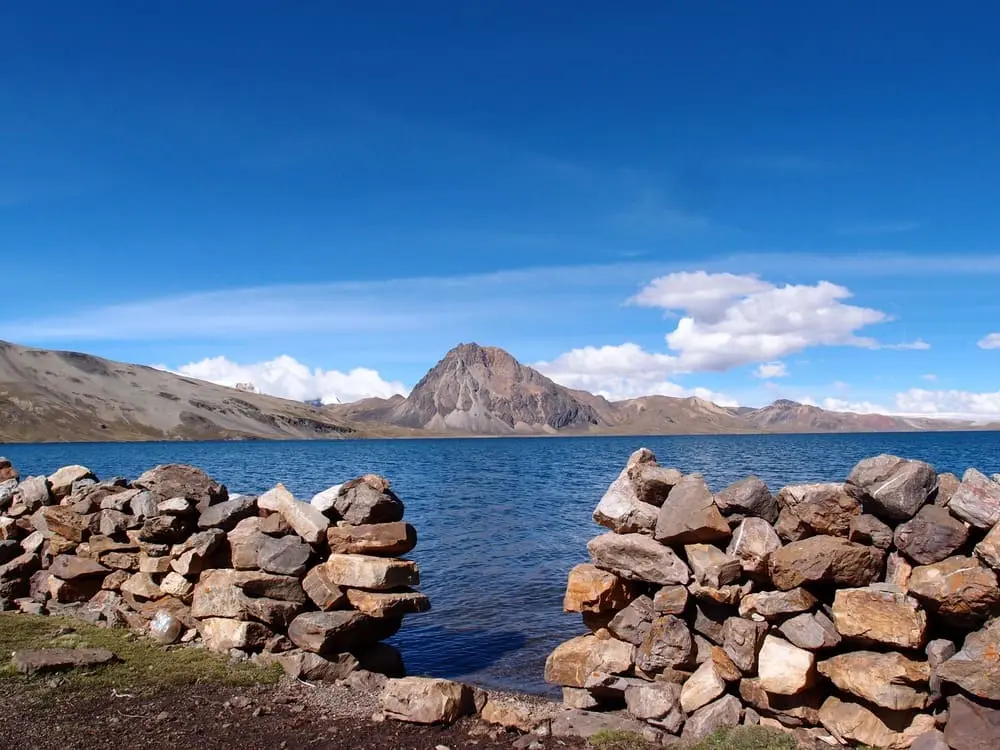 Panoramic view of Sibinaqocha Lake in the Ausangate mountain range of Peru